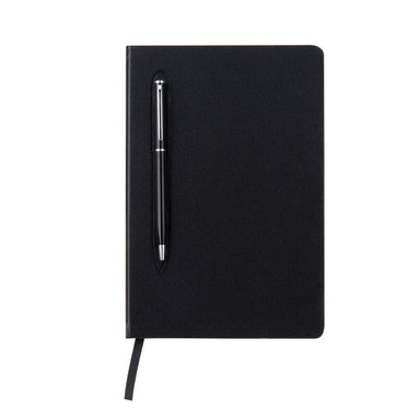 Black ballpoint pen and a notebook