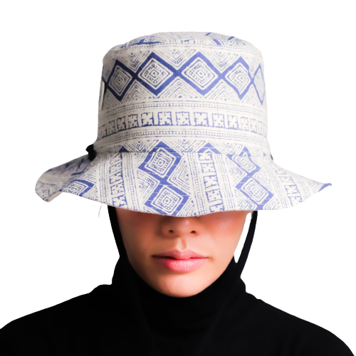 Model wearing a fashionable bucket hat.
