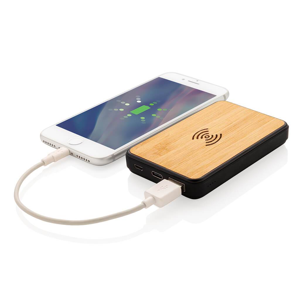 Bamboo Anti-microbial Wireless Powerbank Charging a mobile phone with the cable option