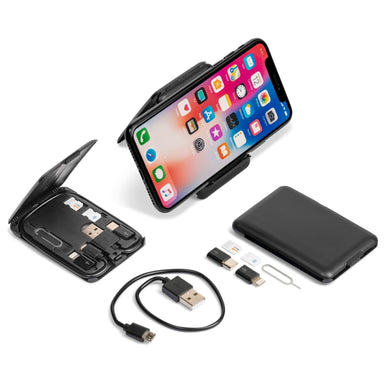 Cable case showing cable contents and wireless charger shown in use charging a mobile phone