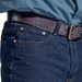 Detail of blue denim shorts showing belt placement