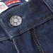 Close up of button detail of blue denim trouser pants 
