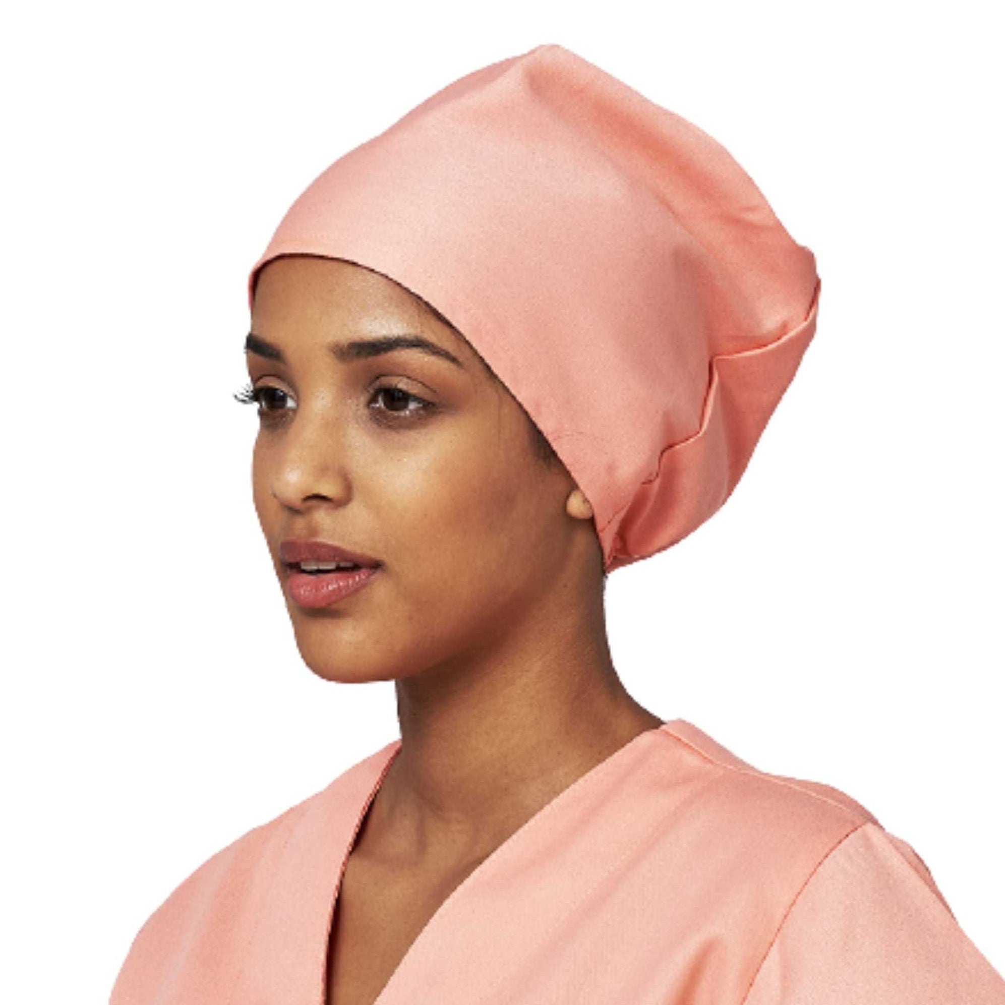 Female model wearing a pink Theatre Cap