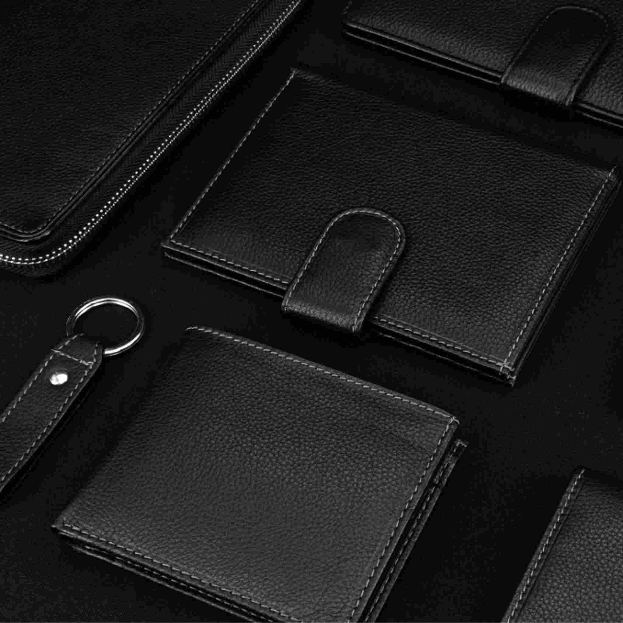 Group of leather wallets and associated goods