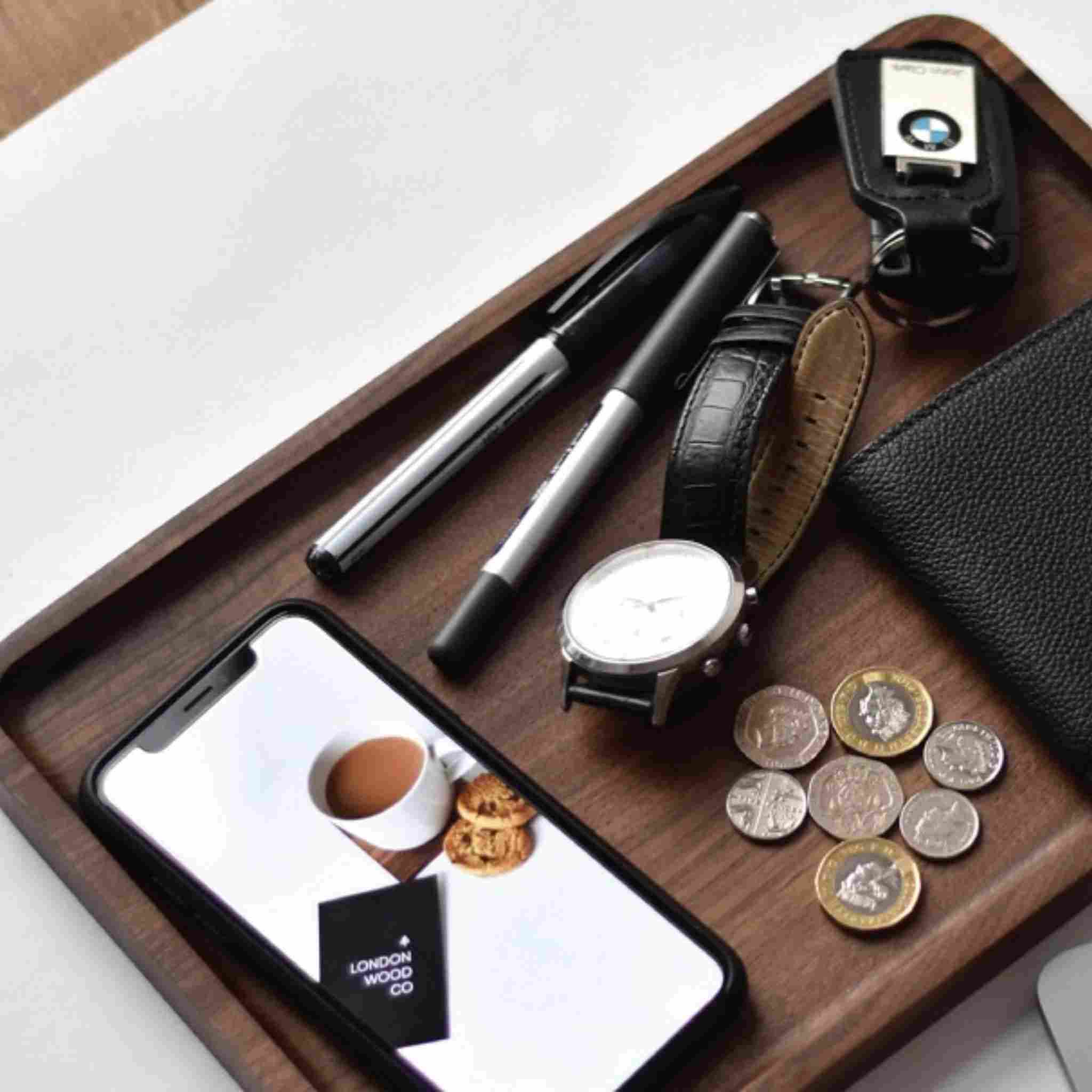 Leather goods and assocated accessories on a tray
