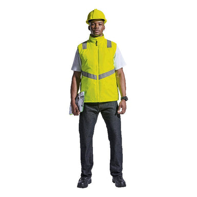 A man showing the front side of a high visibility reflective bodywarmer or sleeveless jacket