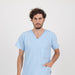 Male model wearing a baby blue floral scrub top