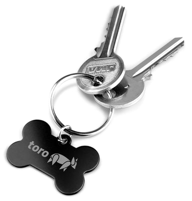 A set of keys on an animal themed keyholder