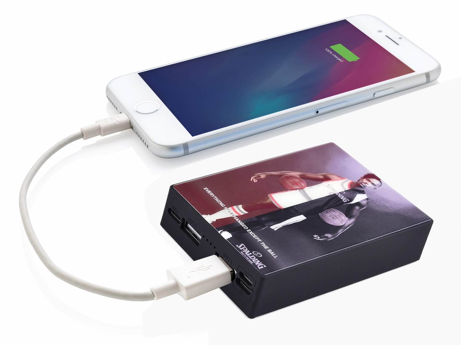 Tempered glass power bank charging a mobile phone