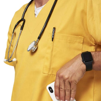 Close-up torso of man wearing a yellow scrub top