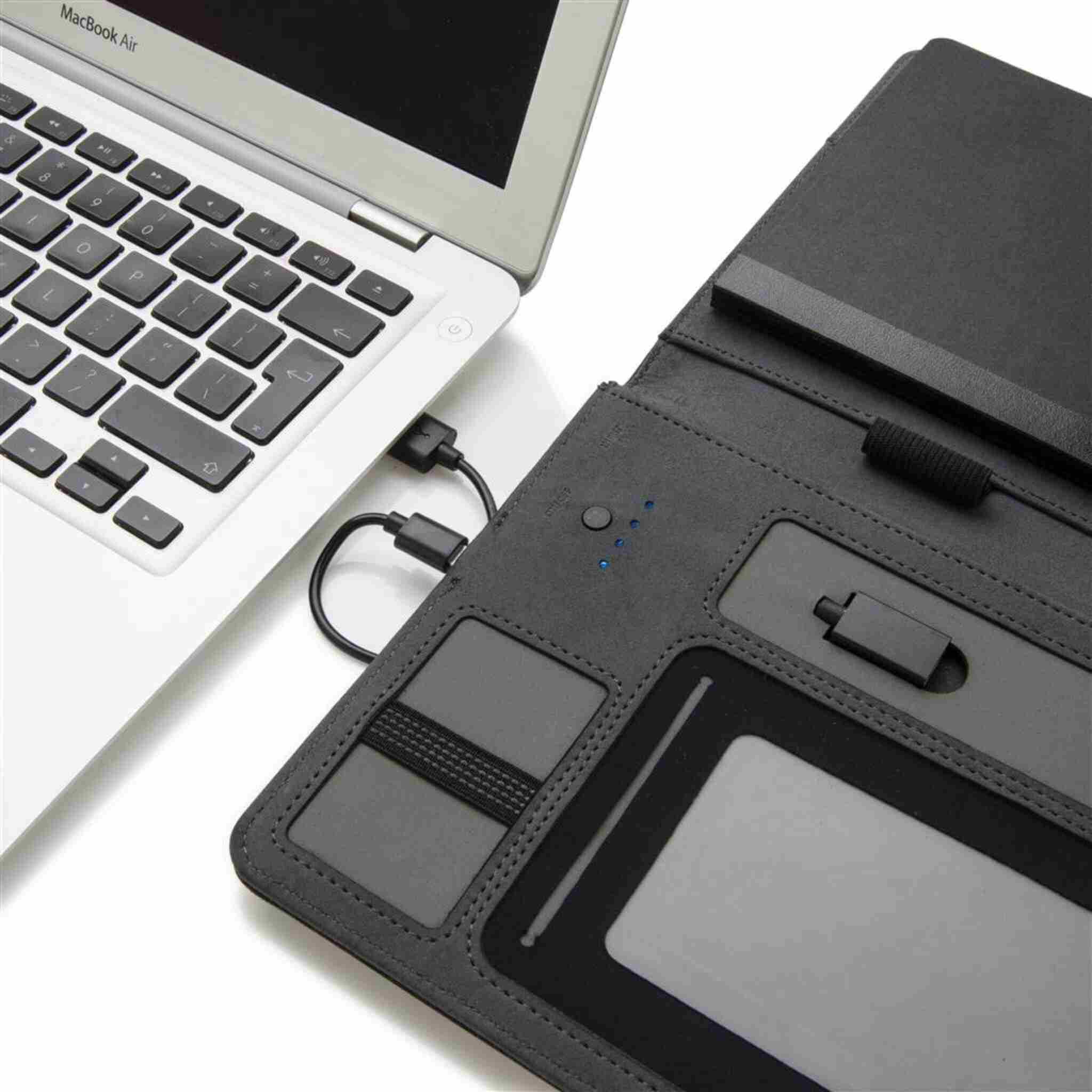 Notebook Portfolio with 3000mAh Powerbank in use with a laptop computer