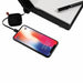 Power bank notebook set charging a mobile phone